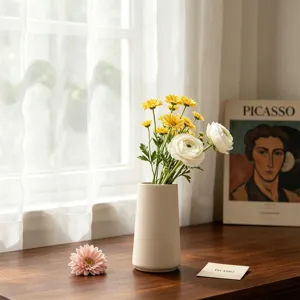 Minimalist cream white ceramic vase or silicone mold for modern home decor and flower arrangement.