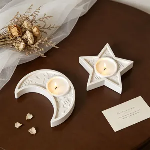 White resin moon and star candle holders set tray for home decoration, aromatherapy and lighting.