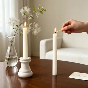 Ins style ribbed pillar candle and elegant white candle holder for home decor and cozy ambiance.