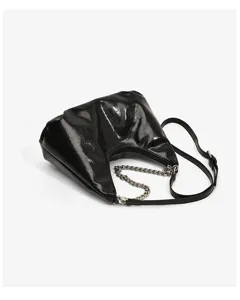 Detailed view of the black patent leather shoulder bag with chic chain strap and sleek design.
