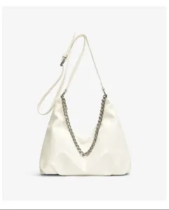 White commuter shoulder bag for women, featuring a stylish chain decoration and adjustable strap.