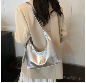 Silver metallic shoulder bag for women, trendy hobo tote bag, casual PU leather underarm bag.