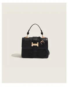 Black woven crossbody bag for women, chic h-clasp shoulder handbag with top handle and strap.