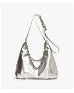 Silver metallic shoulder bag detail showing the chic chain accent and adjustable strap.