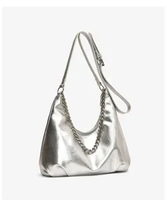 Silver metallic hobo bag detail showing the chic metal chain and adjustable leather strap.