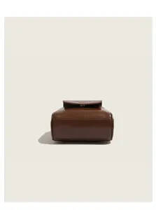 Retro brown mini leather shoulder handbag detail, elegant daily commuting crossbody purse.