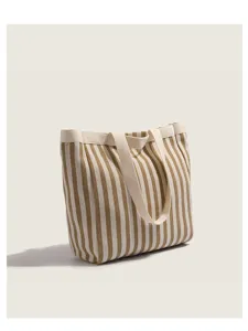 Striped canvas tote bag detail view, large capacity casual shoulder bag for daily commuting and women.