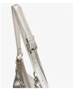 Silver metallic shoulder bag strap and chain accessory detail view, premium commuter handbag.