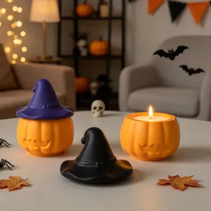 Halloween pumpkin candle holder and storage jar set with witch hat lid for spooky home decor.