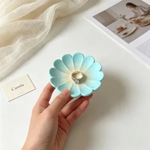 Aesthetic flower shaped jewelry tray silicone mold for DIY home decor and resin crafts.