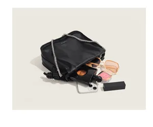 Chic black pleated shoulder chain bag detail view, stylish everyday crossbody bag for women.