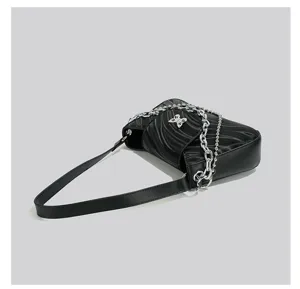 Black baguette shoulder bag for women, chic PU leather underarm bag with chain and butterfly.