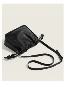 Black casual shoulder crossbody bag for women, stylish pleated drawstring design with adjustable strap.
