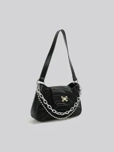 Black shoulder bag for women with chain strap and cute butterfly charm, chic commuter handbag.