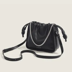 Stylish black leather shoulder bag with chain strap, trendy pleated crossbody bag for women.