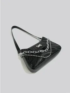 Black baguette shoulder bag for women, trendy niche design with silver chains and butterfly.