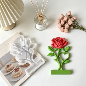 Silicone rose flower candle mold with heart base, perfect for DIY aromatherapy and crafts.