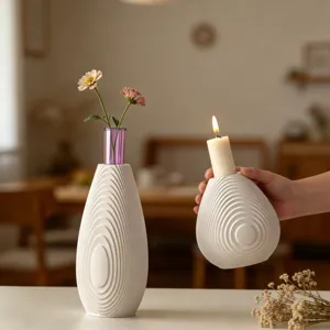 Detailed view of Nordic white water ripple textured ceramic vase and candle holder home decor.