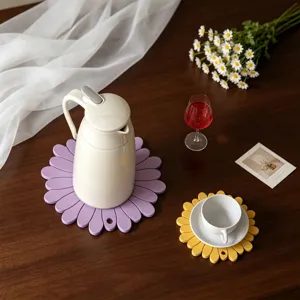 Silicone flower coaster set, cute daisy shape heat resistant mat for table decor kitchen use.