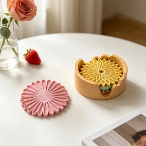 Set de sous-verres marguerite en silicone avec support rond pour la décoration de table.
