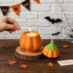 Halloween pumpkin scented candle jar with lid, cute orange wax container for home decor.