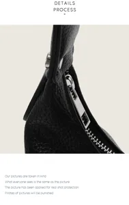 Detailed view of women's black PU leather hobo bag zipper and premium pebble texture.