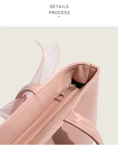 Sac cabas rose vue detail avec fermeture eclair et joli noeud pour mode feminine.