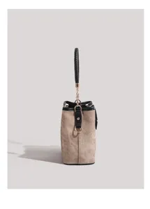 Retro canvas bucket handbag with braided handle side view detail, elegant casual daily bag.