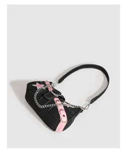 Y2K style black and pink shoulder baguette bag with cool chain strap and star patch.
