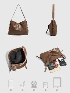 Detailed view of women's vintage brown leather shoulder bag, large capacity tote design.