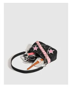 Y2K black canvas baguette shoulder bag detail, sweet and cool style with pink belt and metal chain.