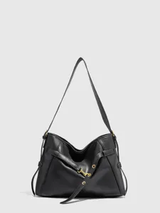 Chic black leather shoulder bag for women, spacious commuter tote with metal hardware.