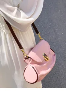 Chic pink soft leather shoulder bag featuring brown strap and elegant gold hardware.