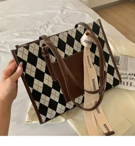 Stylish argyle commuter tote bag with brown leather handles, large capacity daily shoulder bag.
