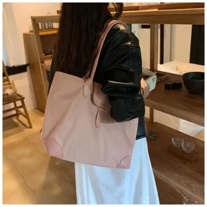 Chic pink tote bag for women large capacity PU leather shoulder bag for daily commute and school.