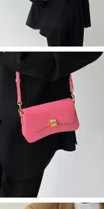 Chic pink shoulder bag, minimalist baguette design for urban women, stylish detail view.