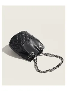 Black quilted bucket bag with chain strap, elegant shoulder bag for women daily commute.
