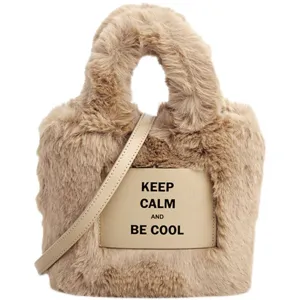 Stylish women fluffy plush bucket bag, autumn winter cozy crossbody handbag with handle.