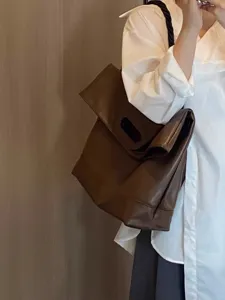 Minimalist soft leather tote bag for women, casual autumn winter shoulder bag daily commute.