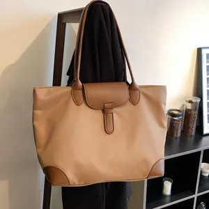 Stylish women's nylon tote bag, large capacity commuting shoulder bag for autumn daily wear.