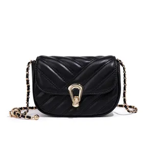 Chic black quilted leather crossbody bag with gold chain and elegant metal lock closure.