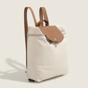 Women casual nylon backpack with brown leather flap, elegant daily school travel bag.