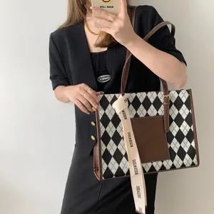 Large capacity commute tote bag for women, stylish black and white argyle pattern design.
