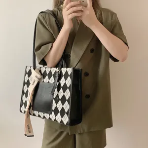 Stylish black and white argyle tote bag for women, large capacity commuter handbag with ribbon.