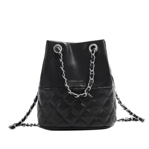 Black quilted bucket bag for women, chic leather shoulder handbag with silver chain strap main view.