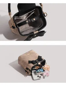 Vintage bucket bag interior and detail view showing large capacity and stylish bow design.