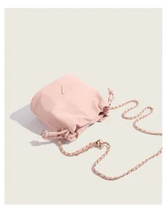 Pink quilted drawstring chain bucket bag stylish puff crossbody bag detailed view