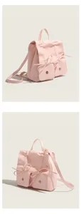Zaino rosa in pelle da donna con fiocco e tasche frontali, elegante borsa casual giornaliera.