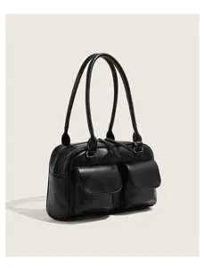 Détail de sac porté épaule bowling vintage noir, cuir PU avec double anses et poches.