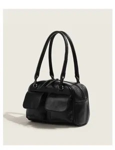 Sac à main bowling vintage noir avec double poignée et poches avant élégantes.